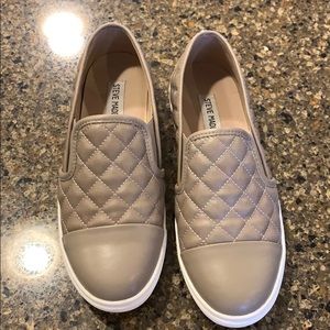 Size 7.5 Steve Madden slip-ons.